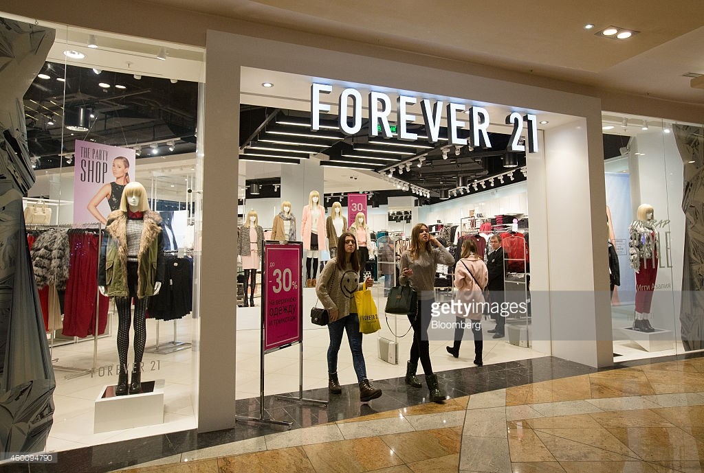 Russian youth exit a Forever 21 fashion store, Moscow.